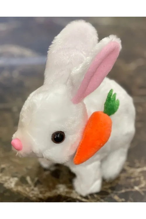 Elektronik Pilli Sesli Zıplayan Hareketli Havuçlu Peluş Tavşan 18x17 Cm.