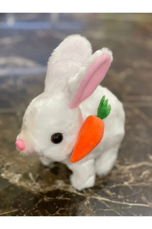 Elektronik Pilli Sesli Zıplayan Hareketli Havuçlu Peluş Tavşan 18x17 Cm.