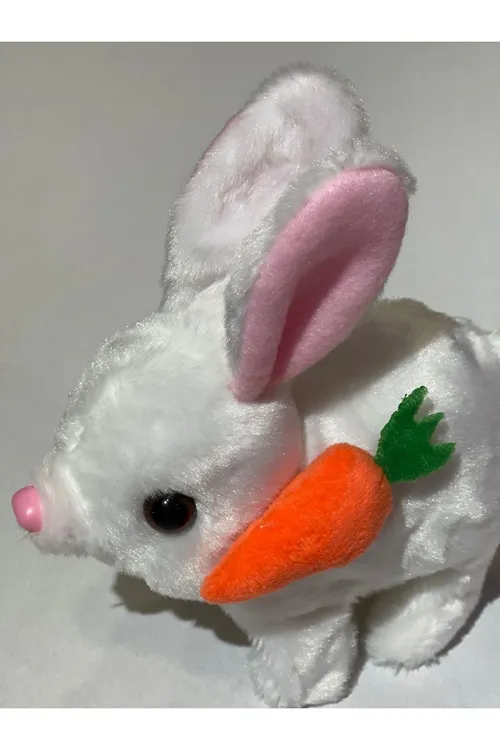 Elektronik Pilli Sesli Zıplayan Hareketli Havuçlu Peluş Tavşan 18x17 Cm.